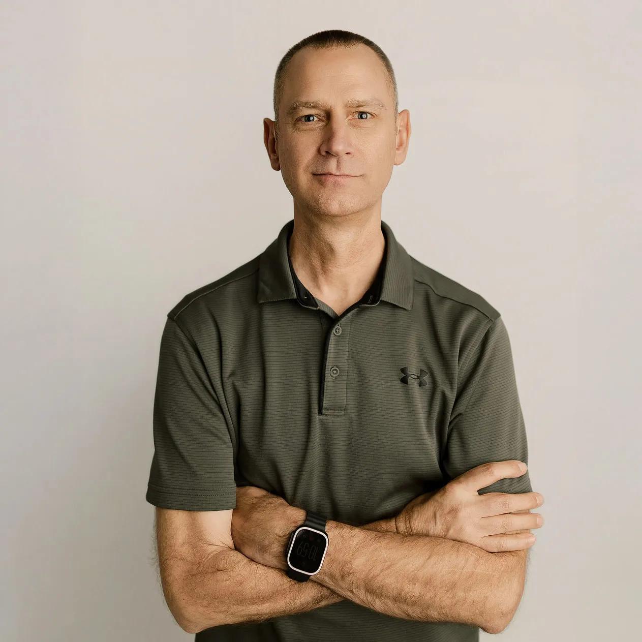 Dan Weaver, accountant, arms crossed facing the camera.